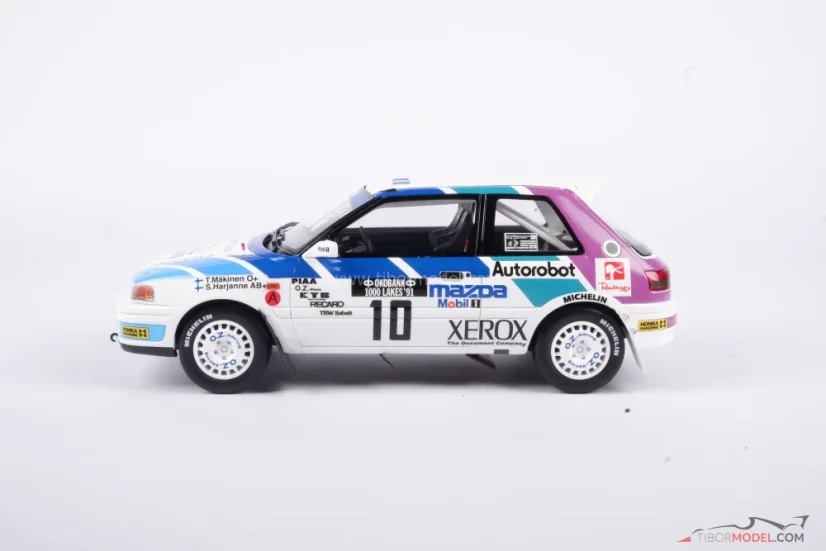 Mazda 323 - Mäkinen/Harjanne (1991) Rally 1000 jazier, 1:18 Ottomobile