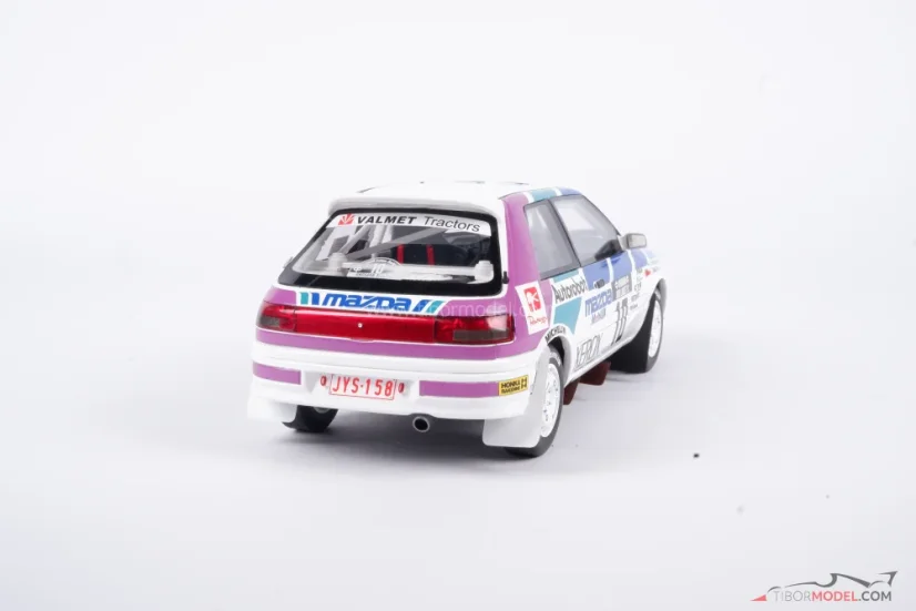 Mazda 323 - Mäkinen/Harjanne (1991) Rally 1000 jazier, 1:18 Ottomobile
