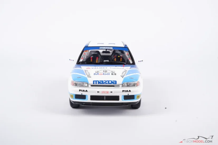 Mazda 323 - Mäkkinen/Harjanne (1991) Rally 1000 jazier, 1:18 Ottomobile