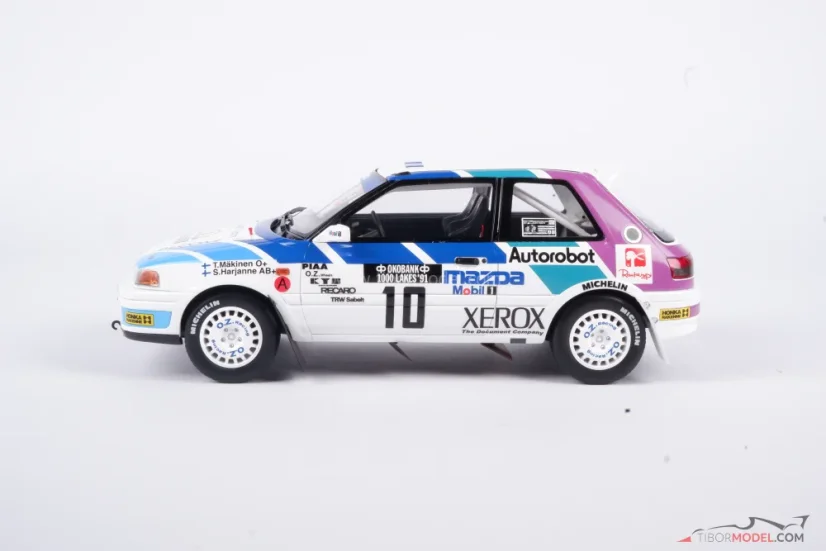 Mazda 323 - Mäkinen/Harjanne (1991) Rally 1000 jazier, 1:18 Ottomobile