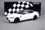 BMW M4 (2020) biele, 1:18 Minichamps