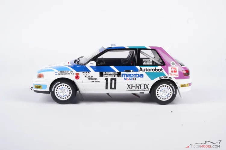 Mazda 323 - Mäkinen/Harjanne (1991), 1000 tó Rali, 1:18 Ottomobile