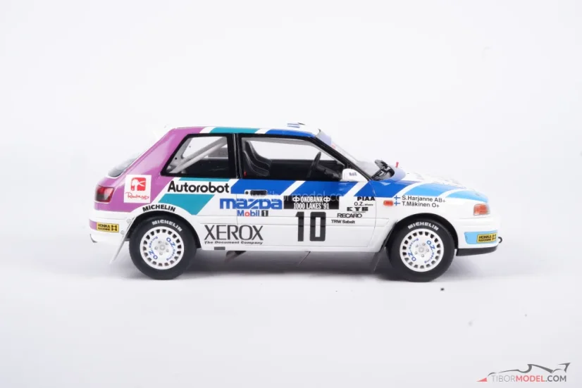 Mazda 323 - Mäkinen/Harjanne (1991) Rally 1000 jazier, 1:18 Ottomobile