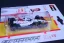 Red Bull RB21 - Max Verstappen (2025) VC Japonska, 1:64 BBurago